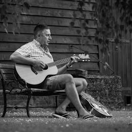 Saul in garden with Guitar