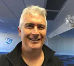 Master Gary Simmons headshot smiling to camera
