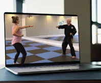 Laptop view of Master Gary Simmons teaching traditional Taekwondo