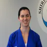Happy 22 year old woman Master Gary Simmons Traditional Taekwondo student