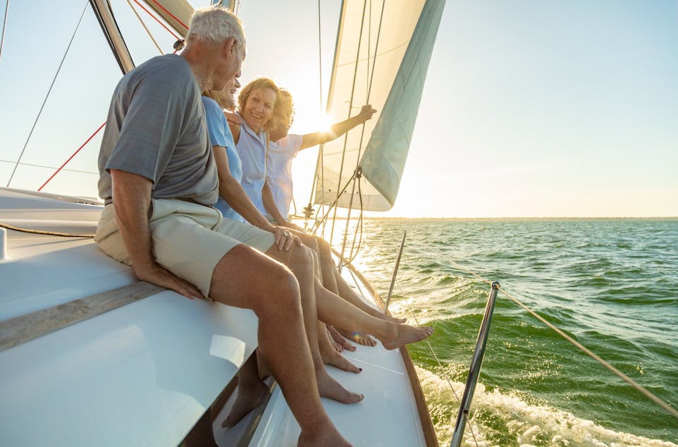 seniors enjoying freedom on yacht