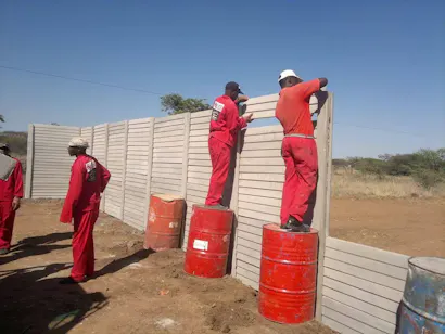 Classy Creations Employees relocating a precast wall