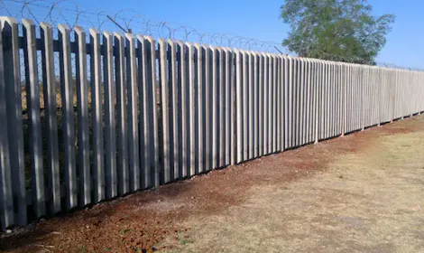Concrete palisade fencing installed by Classy Creations for a commercial property in Limpopo