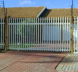 Custom Gate made from steel palisades installed by Classy Creations