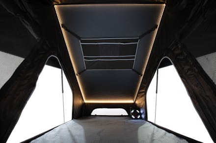 Studio product photo of a tent with door open showing interior, photographed in Brisbane