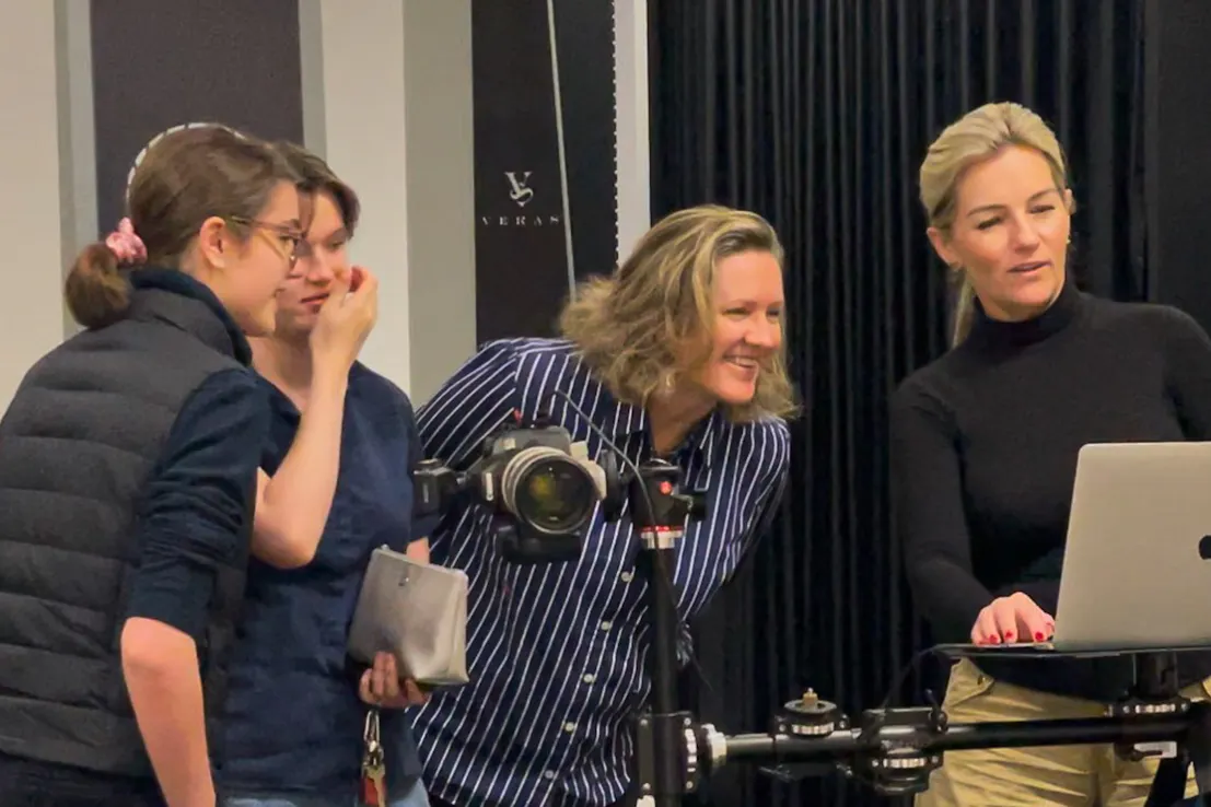 Behind the scenes of actor headshot photography in Brisbane with photographer coaching facial expressions and performance.