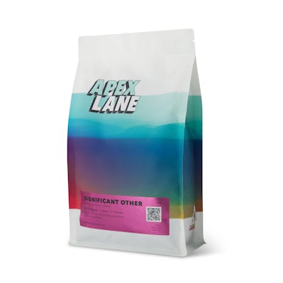 Single coffee package photographed at an angle in a Brisbane studio, highlighting the packaging design and texture