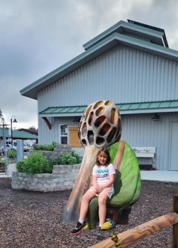child seat sculpture with mushroom