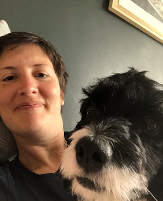 A selfie of the author and her dog at home